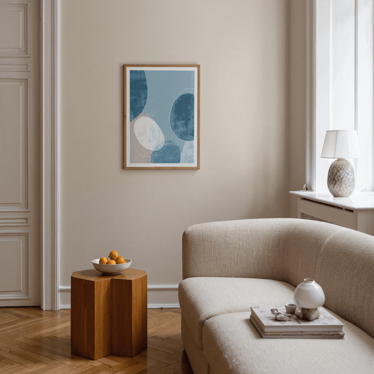 Minimalist abstract poster showing overlapping rounded forms with worn texture