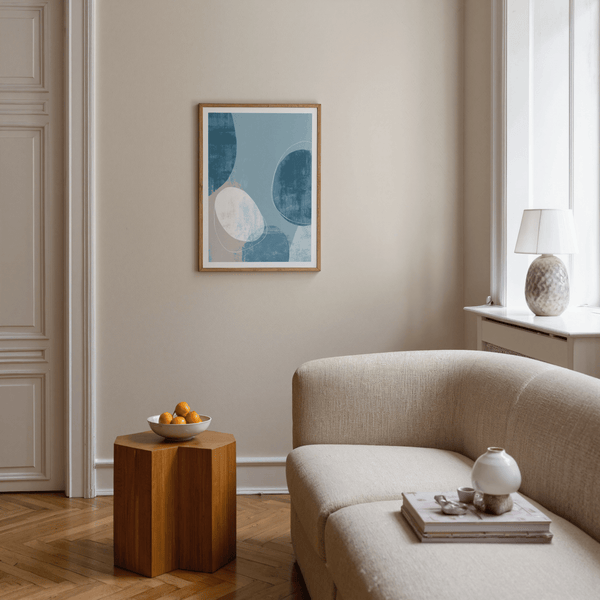 Minimalist abstract poster showing overlapping rounded forms with worn texture