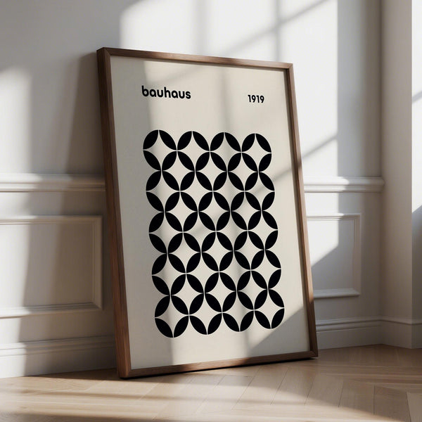 Black geometric mid century wall print with retro Bauhaus pattern on beige background.