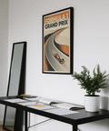Cropped print detail of the racetrack curve and lane lines on a motorsport poster