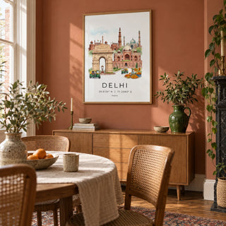 Delhi Landmark Art Print, framed on the wall of a relaxed dining room in a UK Victorian terrace with a muted terracotta wall and warm timber flooring