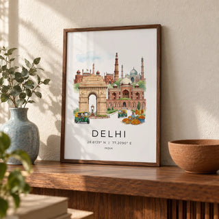 Delhi Landmark Art Print, a small A4 framed print leaning on a walnut shelf in a living room