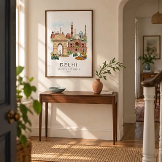 Delhi Landmark Art Print, framed on the wall of a welcoming hallway in a characterful UK flat with warm white walls and a shallow arched doorway