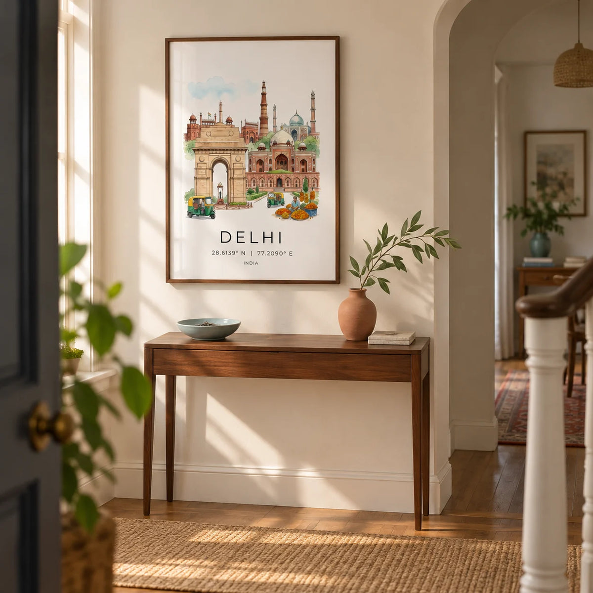 Delhi Landmark Art Print, framed on the wall of a welcoming hallway in a characterful UK flat with warm white walls and a shallow arched doorway