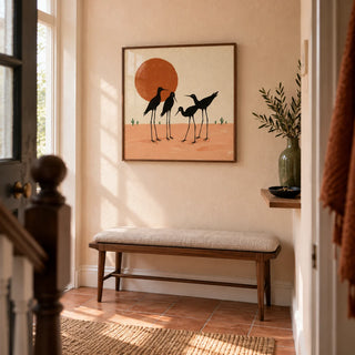 Desert Birds Wall Art, framed on the wall of a welcoming narrow hallway in a UK terraced house with pale peach plaster walls and simple terracotta floor tiles