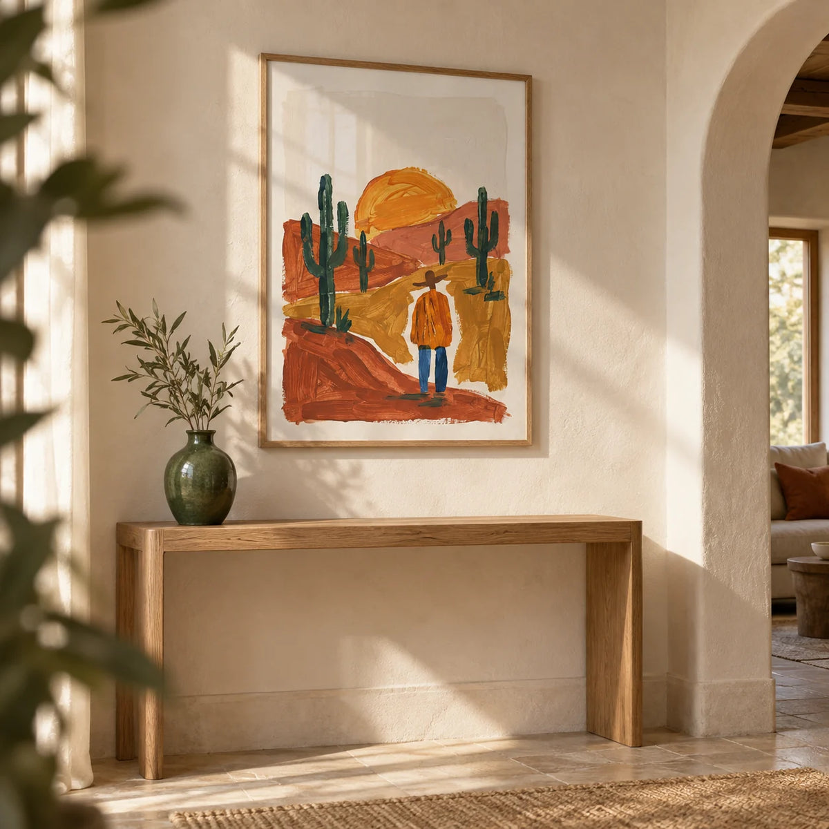 Desert Landscape Art Print, framed on the wall of a desert-modern hallway with an arched doorway and limewashed walls