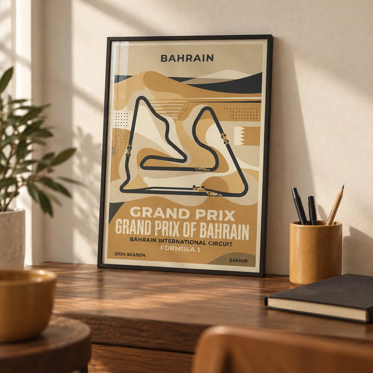Desert Race Circuit Poster, a small A4 framed print leaning on a walnut desk