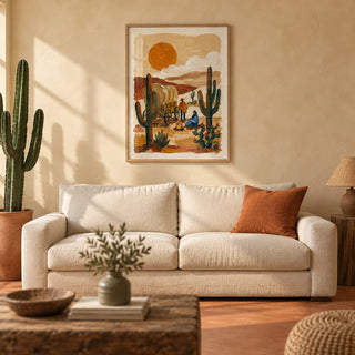 Desert Wagon Art Print, framed on the wall of a desert-modern living room with a warm sand limewashed wall and a plain terracotta floor