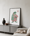 Minimalist animal poster of a frog character with stamp-like mark in corner
