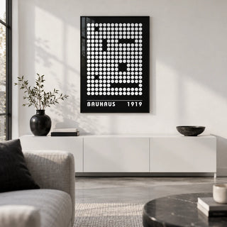Digital Wall Art, framed on the wall of a monochrome city-flat living room with a white wall and polished concrete