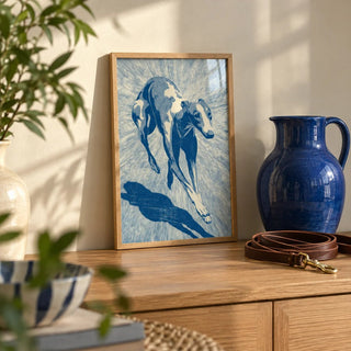 Dog Wall Art, a small A4 framed print leaning on an oak sideboard in a living room