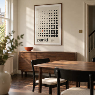 Dots Print, framed on the wall of a modern dining room in a UK terraced house with a cream wall and dark timber floor