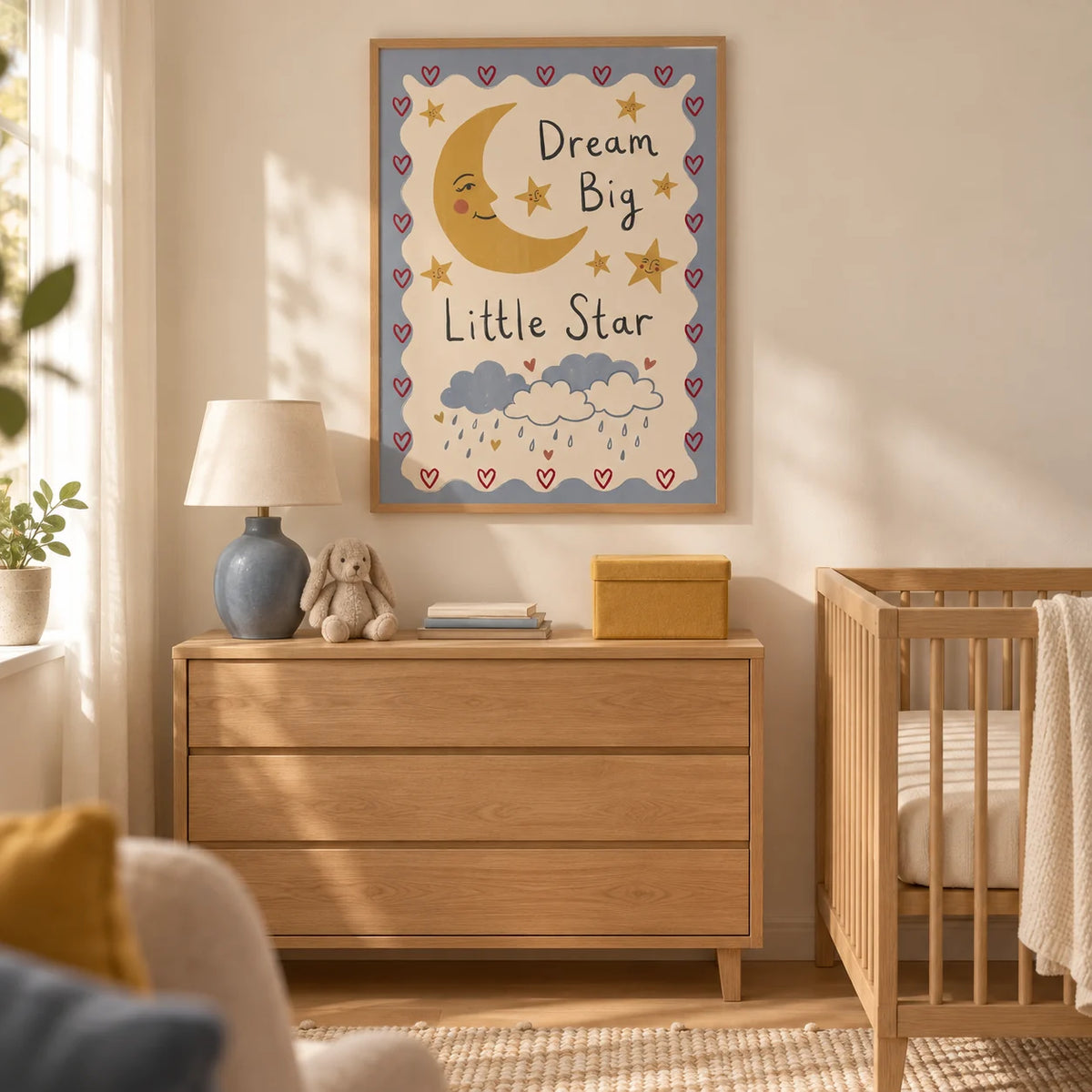 Dream Big Poster, framed on the wall of a gentle nursery in a UK family home with warm cream walls and a pale oak floor