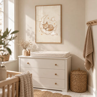 Moon And Sun Print, framed on the wall of a compact nursery changing alcove in a UK flat with a pale beige wall and white-painted floorboards