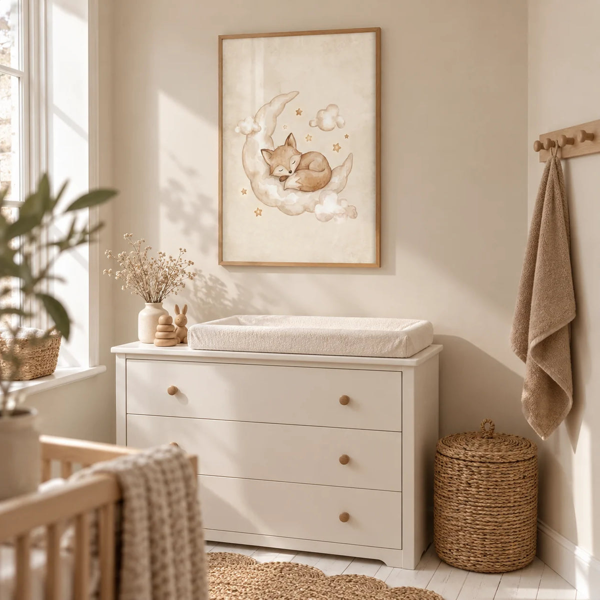 Moon And Sun Print, framed on the wall of a compact nursery changing alcove in a UK flat with a pale beige wall and white-painted floorboards