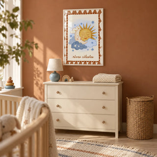 Moon And Sun Print, framed on the wall of a compact nursery dressing nook in a UK flat with a muted terracotta wall and pale wood flooring
