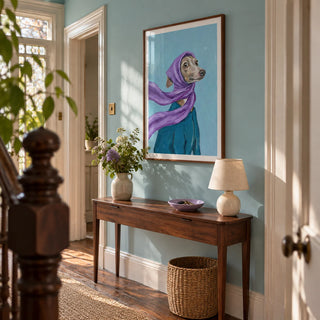 Dressed Up Dog Art, framed on the wall of a characterful hallway in a Victorian terrace with pale aqua walls and warm timber floorboards