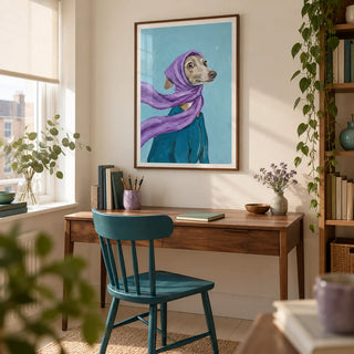 Dressed Up Dog Art, framed on the wall of a creative home study in a small UK flat with a warm white wall and a pale timber floor