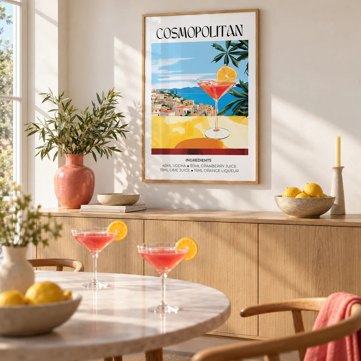Drink Art, framed on the wall of a bright dining room with a warm white wall