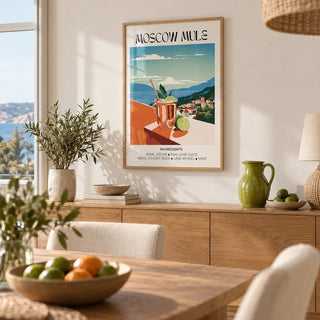 Drinks artwork, framed on the wall of a coastal dining room with a warm white wall