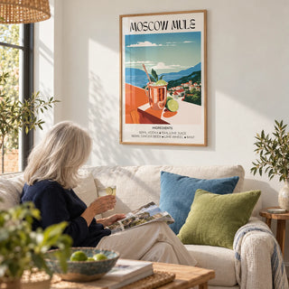 Drinks artwork, framed on the wall of a sunny garden room living space with a white wall in a living room