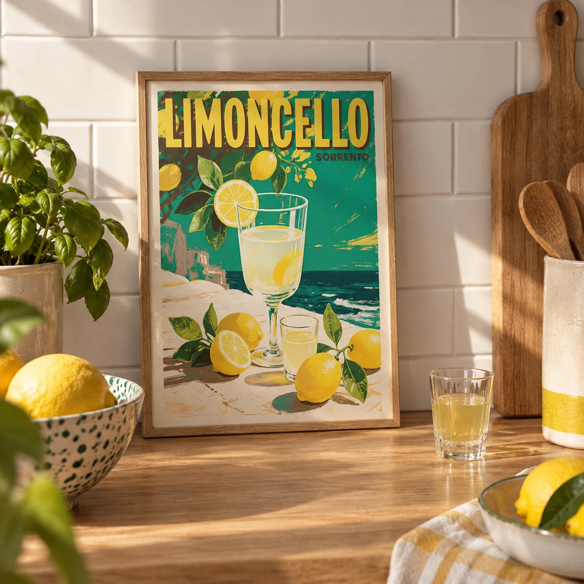 Drinks Wall Art, a small A4 framed print leaning on an oak worktop in a kitchen
