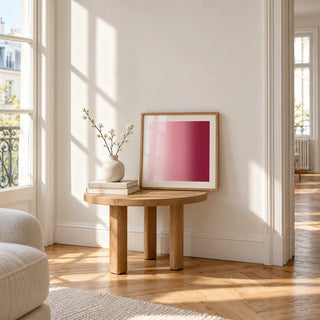 Dusty Rose Wall Art, a small square framed print leaning on a small solid oak side table