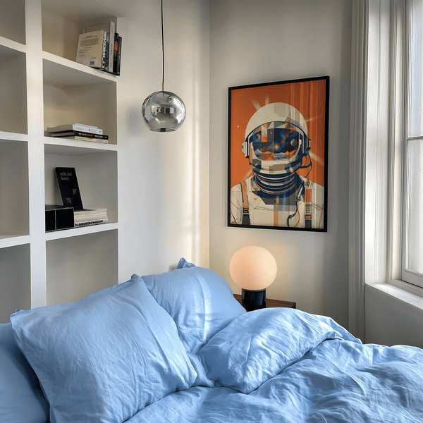 Modern Astronaut Poster using orange, blue, and beige for bedroom décor