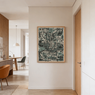 Overhead shot of desk decor displaying graphic street map print in cool tones