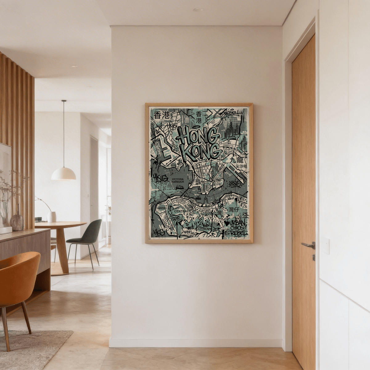 Overhead shot of desk decor displaying graphic street map print in cool tones