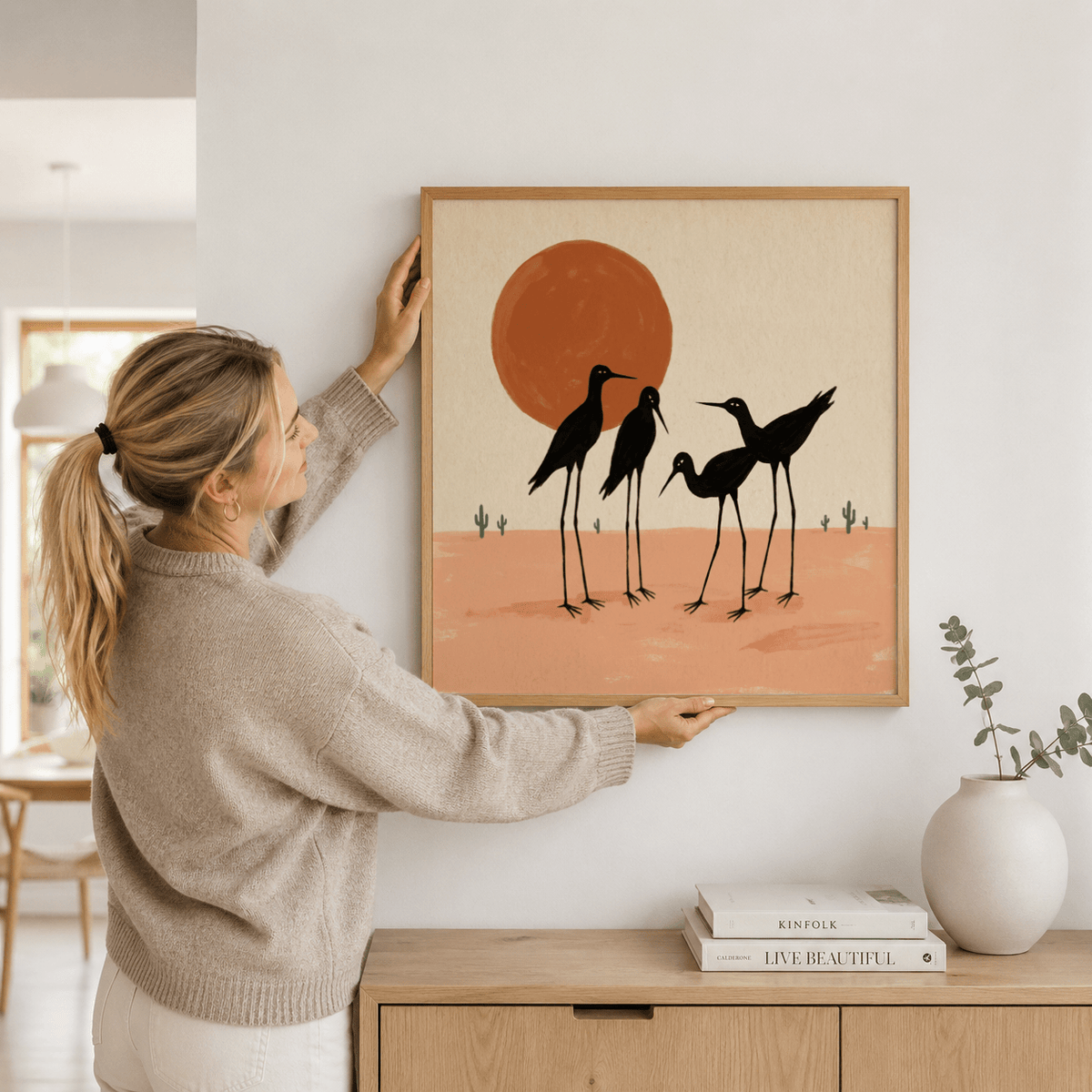 Side angle of Desert Birds Wall Art hung above sofa