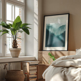 Mountain wall art in teal and navy tones with abstract texture.