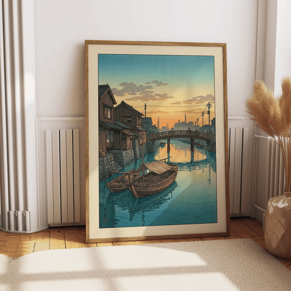 Quiet canal at evening showing arched bridge and reflections