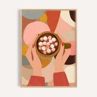 Framed Hot Chocolate wall art showing hands holding a cup with marshmallows against abstract coloured shapes