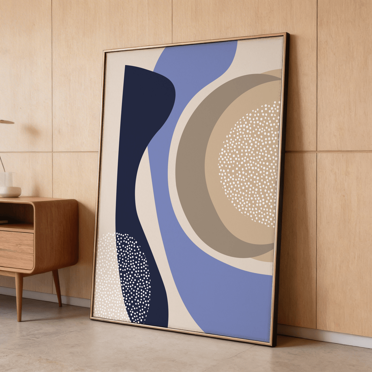 Minimalist abstract wall art featuring overlapping arcs and dotted circular detail