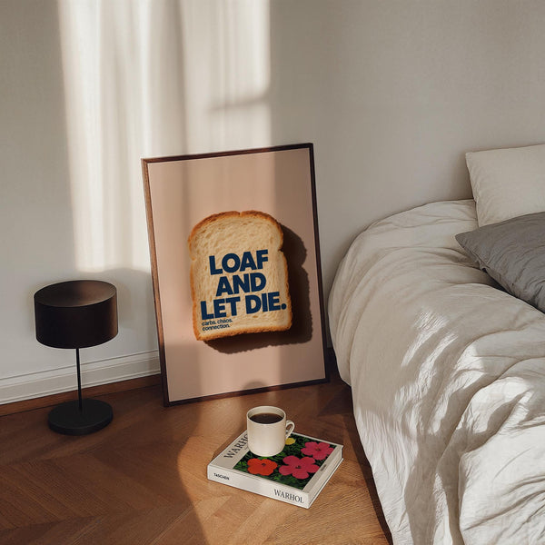 Bold navy typography on bread captured in quirky kitchen art.