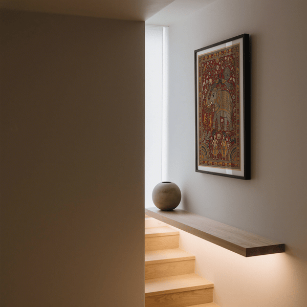 Traditional-style elephant poster showing saddle cloth patterns, lotus blooms, and perched birds