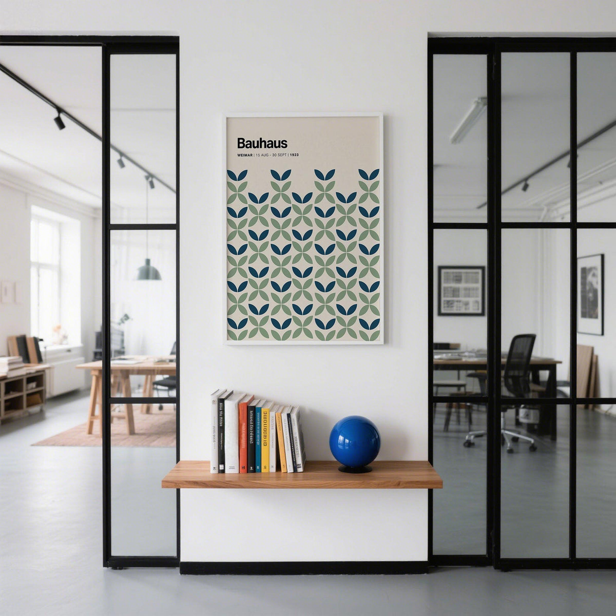 Mid-century modern blue and green wall art with symmetrical petal layout.