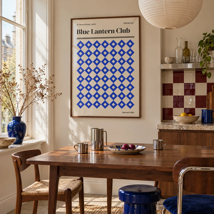 Edinburgh Print, framed on the wall of a kitchen dining corner by a tall window in soft daylight