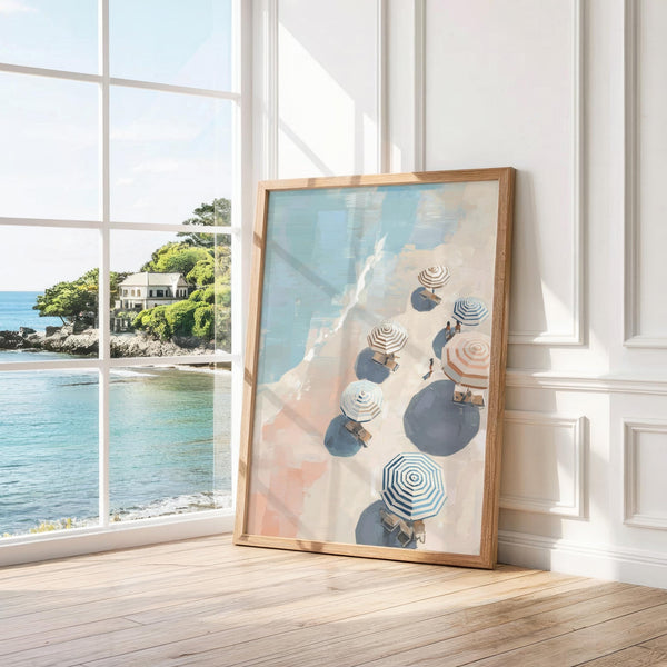 Coastal beach umbrella print featuring overhead view of beachgoers.