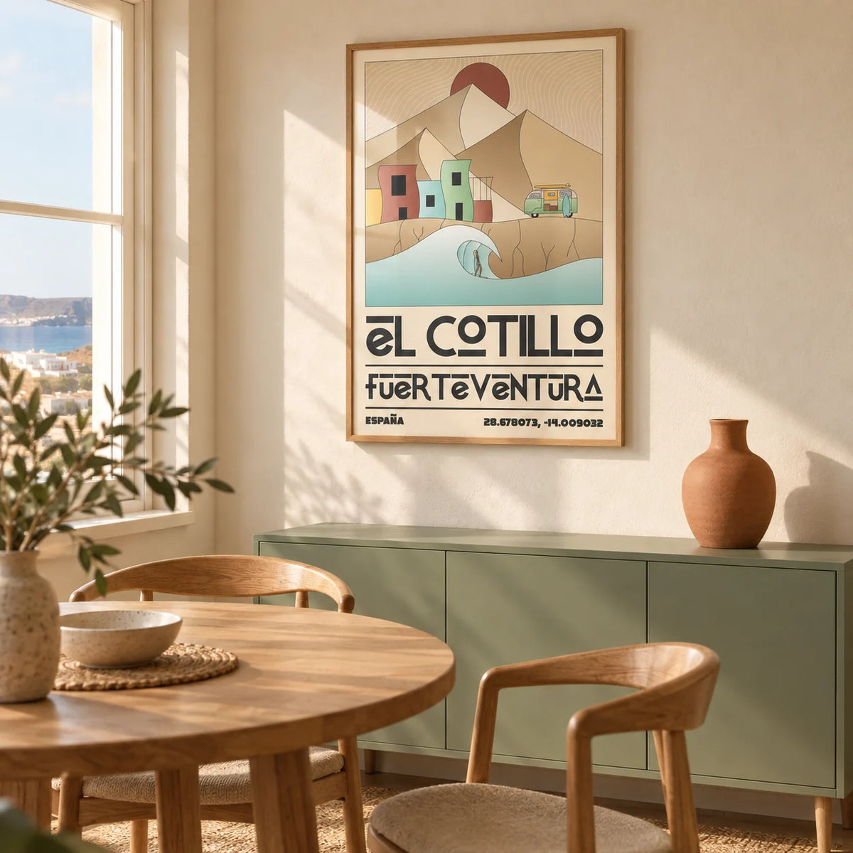 El Cotillo Surfing Poster, framed on the wall of a modern dining corner in a UK coastal flat with warm cream plaster walls
