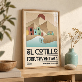 El Cotillo Surfing Poster, a small A4 framed print leaning on a pale oak shelf in a living room