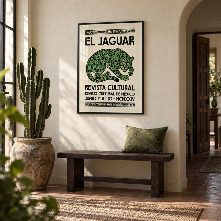 El Jaguar Poster, framed on the wall of a hallway with a cream limewashed wall and an arched doorway