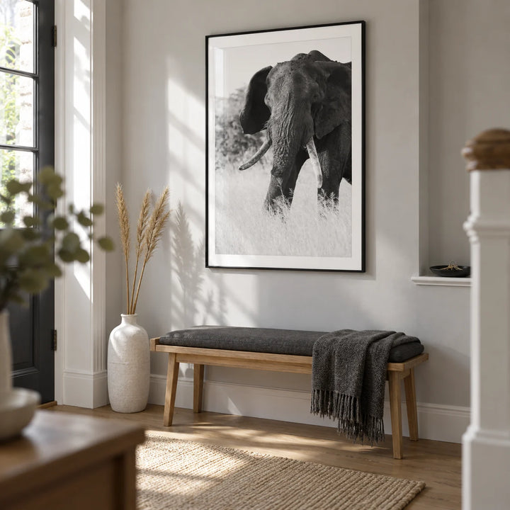 Elephant Black And White Art Print, framed on the wall of a bright entrance hallway in a UK townhouse with a pale grey wall and oak floorboards