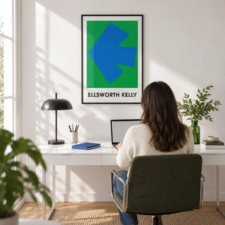 Ellsworth Kelly Art Print, framed on the wall of a bright modern home office with a white wall and a light oak floor