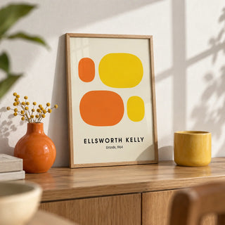 Ellsworth Kelly Prints, a small A4 framed print leaning on an oak shelf in a living room