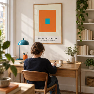 Ellsworth Kelly Artwork, framed on the wall of a bright home study in a renovated UK terrace with an off-white wall and a built-in shelf of neatly arranged plain books