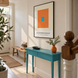 Ellsworth Kelly Artwork, framed on the wall of a crisp entrance hallway in a UK terraced house with warm white walls and a pale stone floor