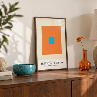 Ellsworth Kelly Artwork, a small A4 framed print leaning on a walnut sideboard in a living room