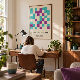 Ellsworth Kelly Pictures, framed on the wall of a bright home study in a renovated UK terrace with a cream wall and a built-in walnut bookcase to one side